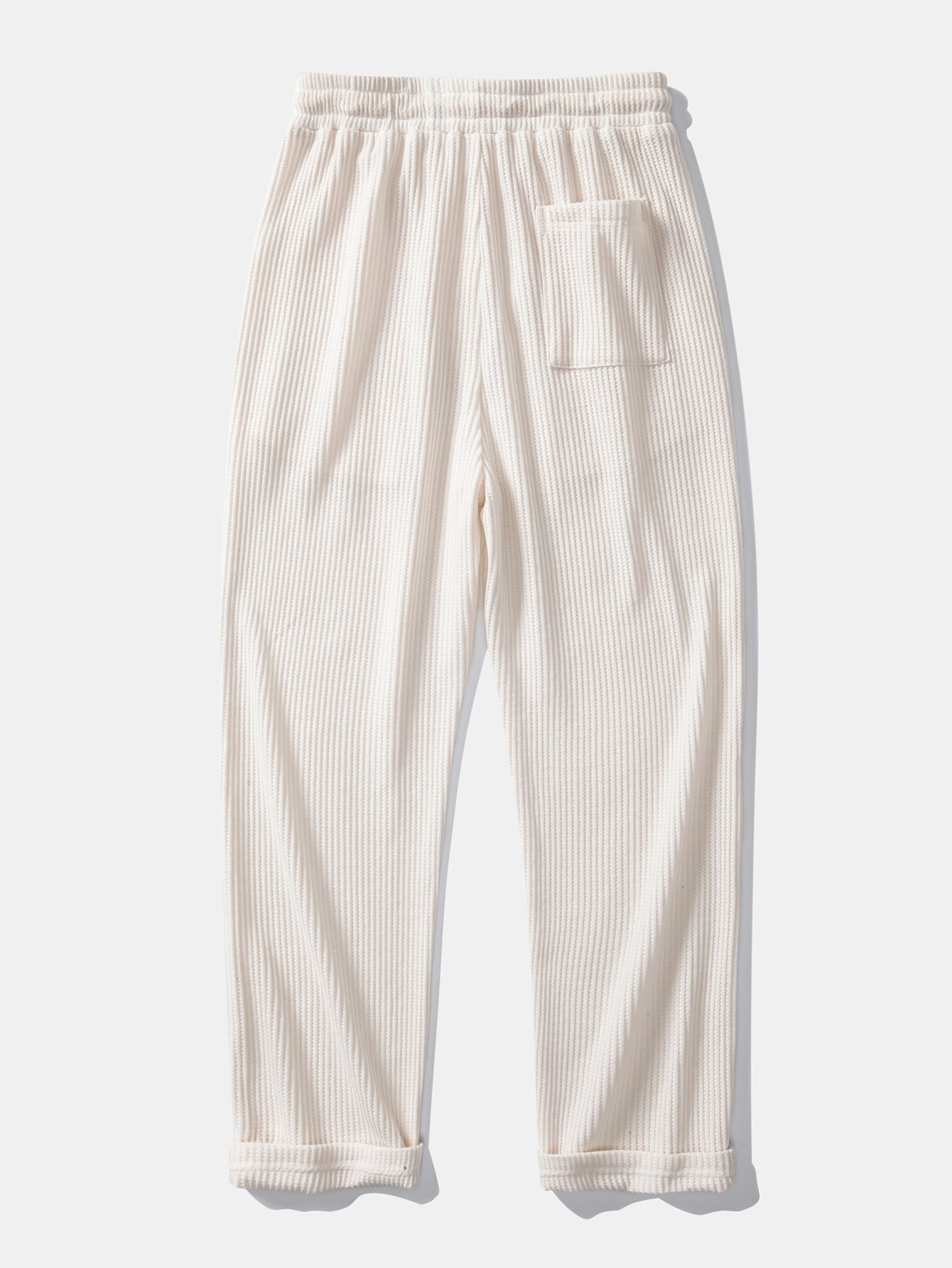 Polo de punto con cuello Johnny a rayas y pantalones de punto con cordón