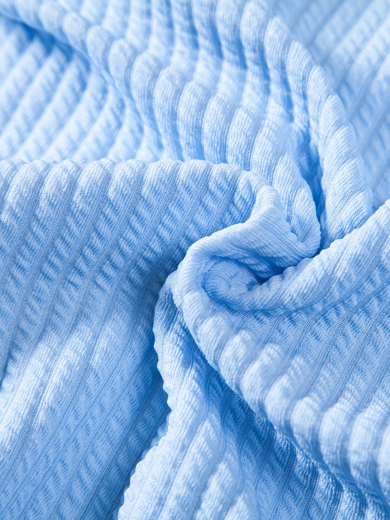 Polo de canalé con cuello en V y manga corta y pantalones cortos de canalé con cordón