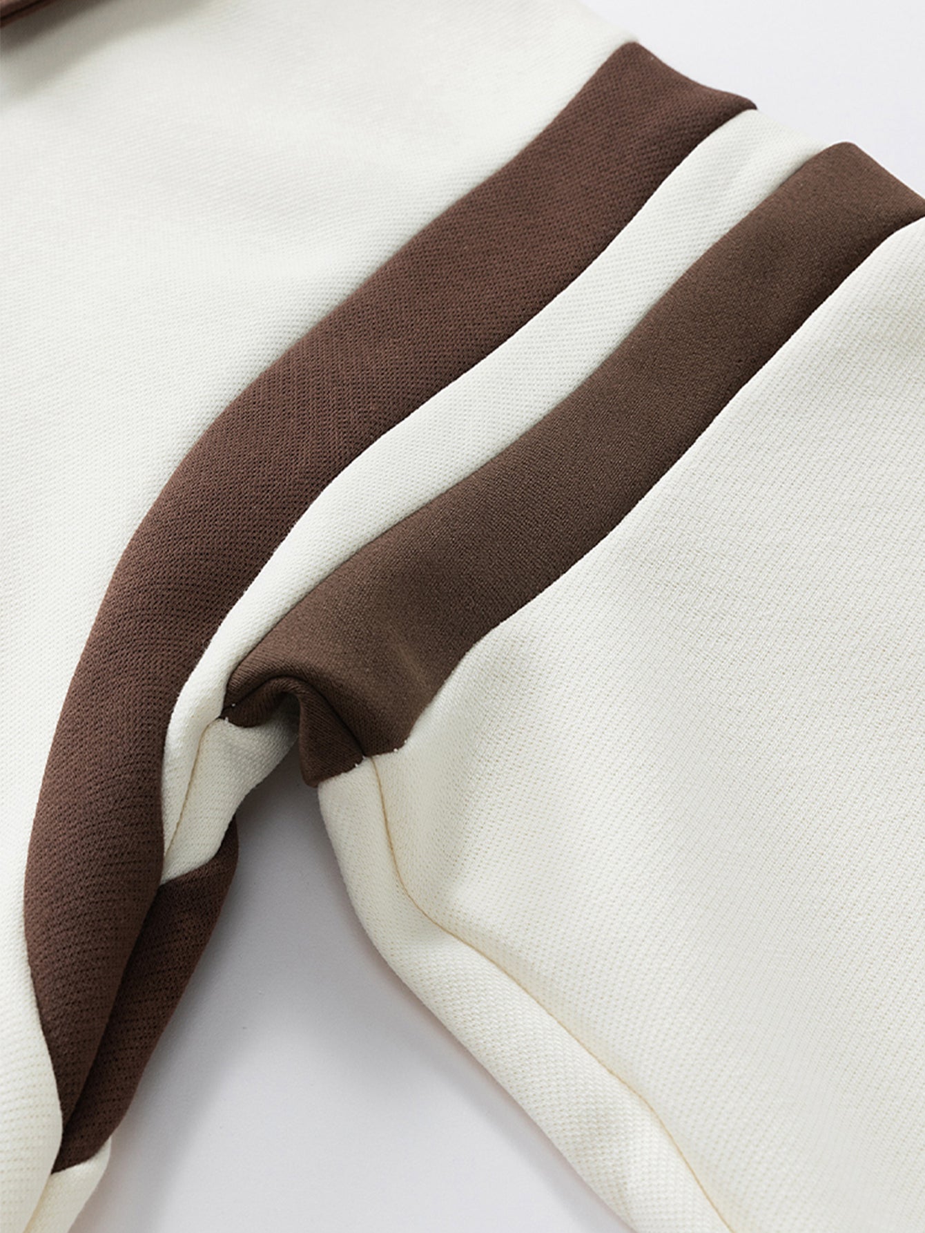 Sudadera polo con cremallera y bloques de color