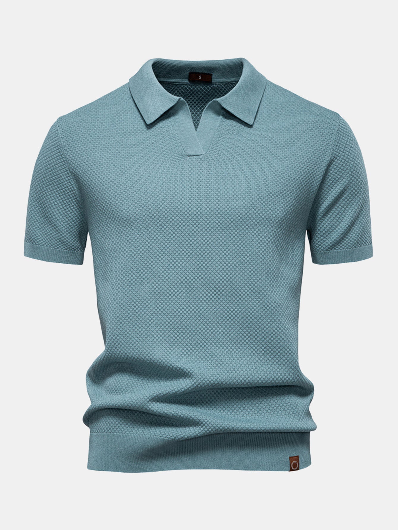 Polo de punto con textura de piña y cuello en V y pantalones rectos acanalados