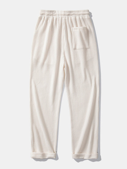 Polo de punto con cuello Johnny a rayas y pantalones de punto con cordón