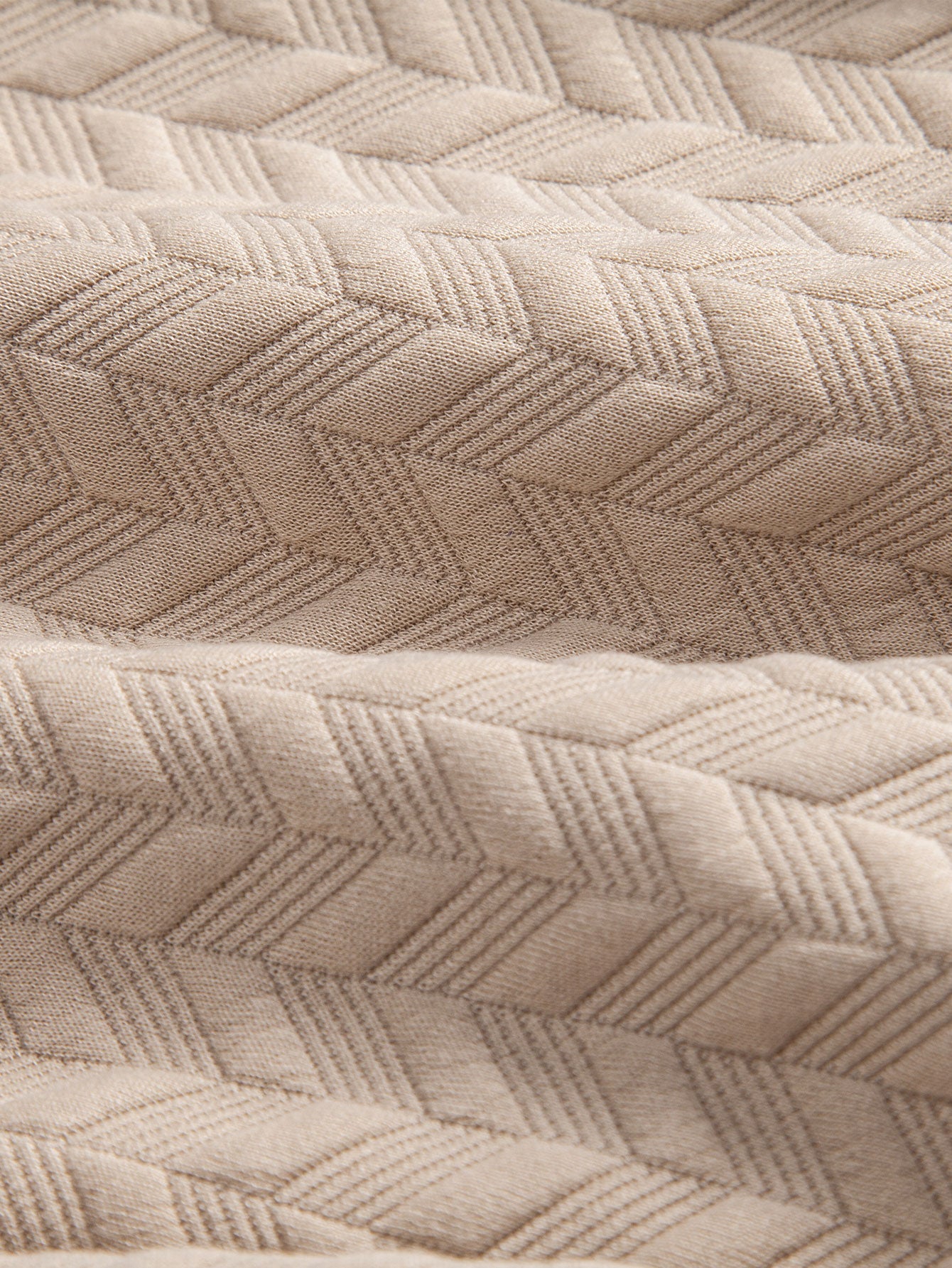 Polo y pantalones cortos de jacquard geométrico