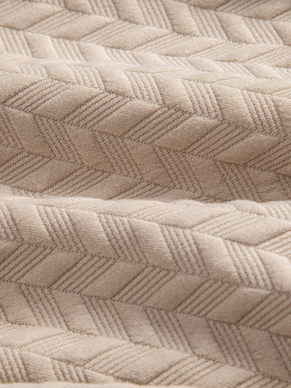 Polo y pantalones cortos de jacquard geométrico