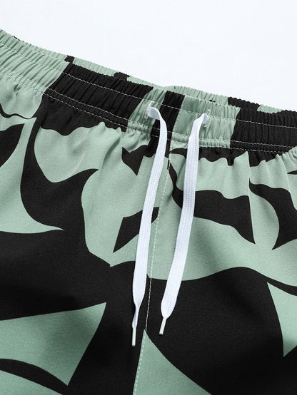 Pantalones cortos con bolsillos y cremallera y estampado de bloques de color