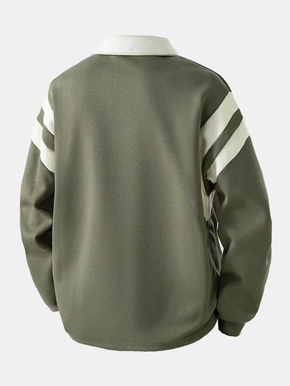 Sudadera polo con cremallera y bloques de color