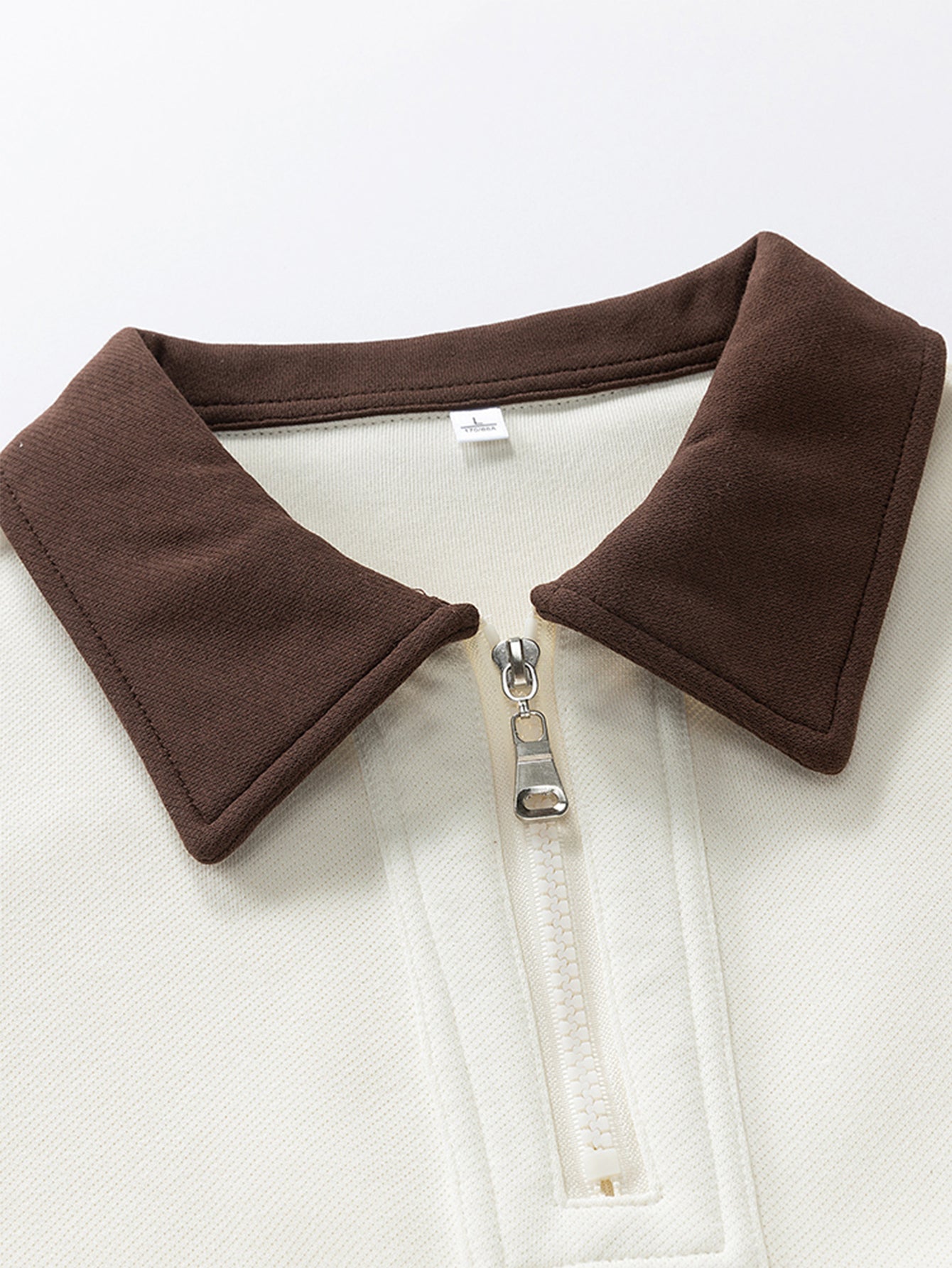 Sudadera polo con cremallera y bloques de color