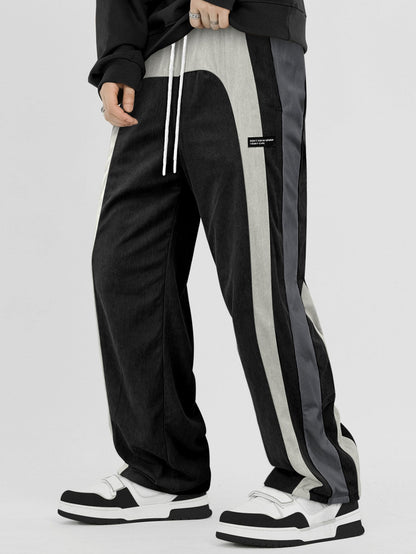 Pantalones rectos de pana con bloques de color